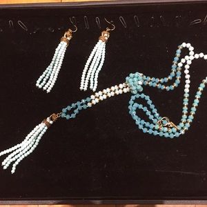 New blue beaded necklace with matching earrings.